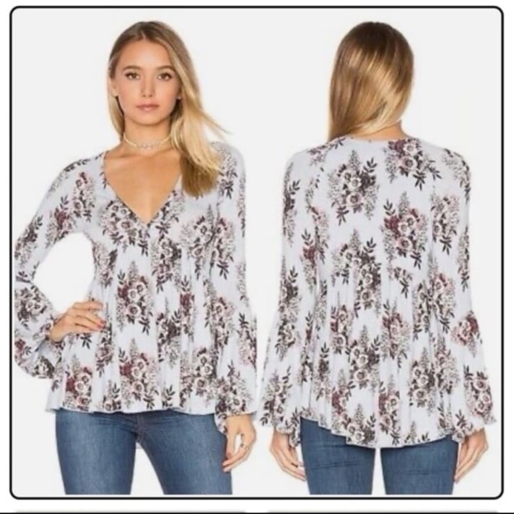 Free People Speak Easy Tunic Top
Blue Floral Print Bell Sleeves
Size Small